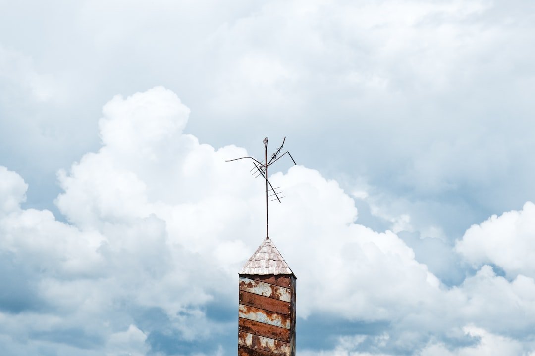 I’ve always been fascinated and inspired by sculpture. My wife and I were exploring a local sculpture garden and the clouds were billowing and rolling like I had never seen before, and I started thinking about the quiet and calm moments we find in the middle of stress and busyness. This image was taken in the center of a city with traffic noise, construction, and a thousand other things happening all at once, but for a moment you can find a piece of quiet in the midst of it all.